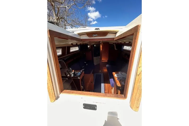 Slide: The Image of Control panel of a 1984 Pearson 34 sailboat with gauges and switches. - 16