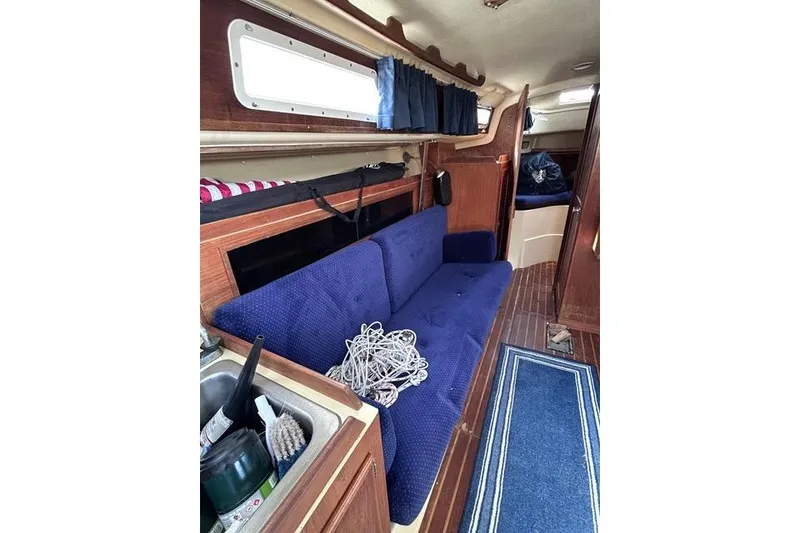 Slide: The Image of Interior of 1984 Pearson 34 sailboat showing cabin hatch and wooden furnishings. - 9