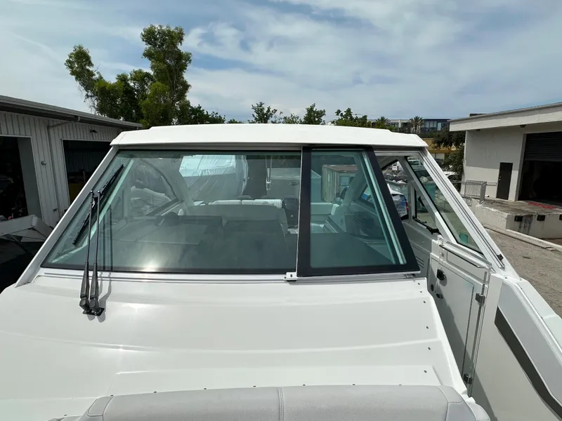 Slide: The Image of 2021 Formula 380 SSC boat front view with windshield and wipers. - 13