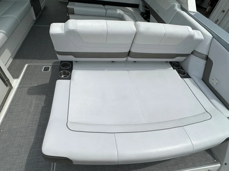 Slide: The Image of 2021 Formula 380 SSC boat interior with spacious seating and cup holders. - 14