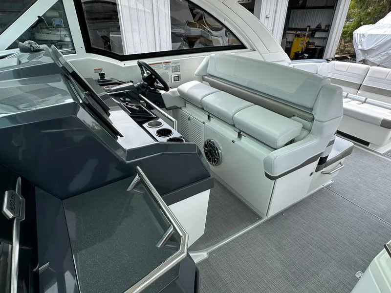 Slide: The Image of 2021 Formula 380 SSC boat interior with modern helm and seating area. - 21