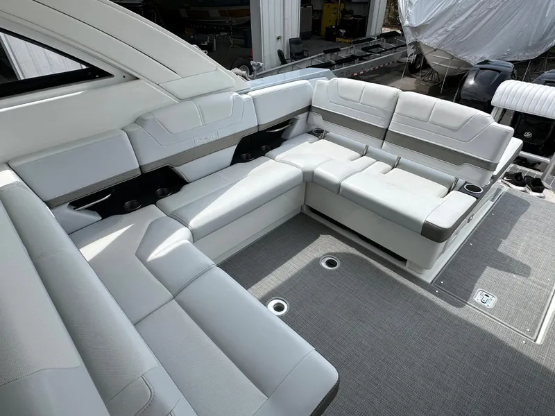 Slide: The Image of 2021 Formula 380 SSC boat interior with luxurious white seating. - 22