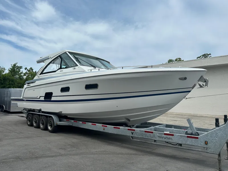 Slide: The Image of 2021 Formula 380 SSC boat on a trailer, side view. - 5
