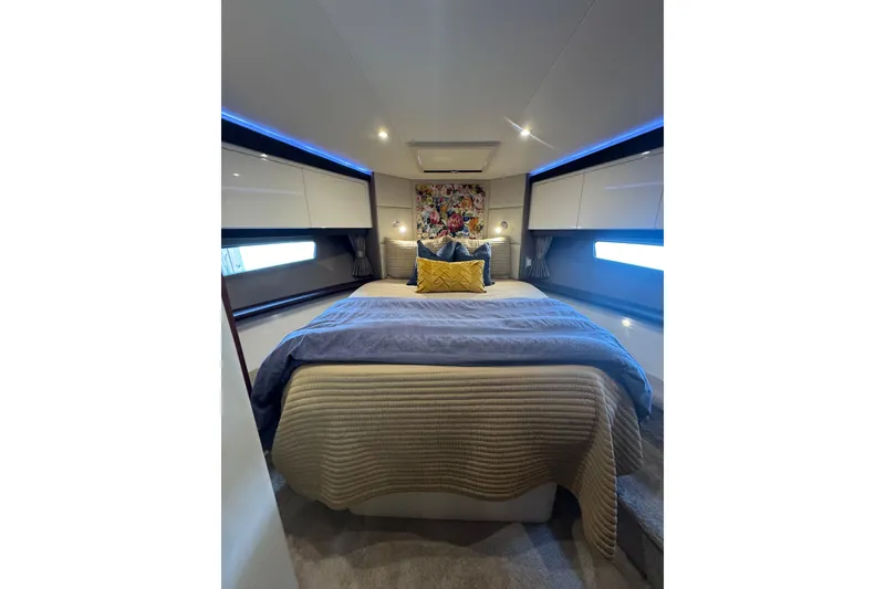 Slide: The Image of Luxurious bedroom interior of 2016 Carver C37 Coupe yacht with modern decor. - 49