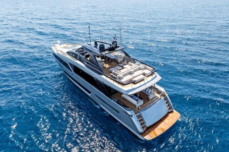 Slide: The Image of Luxurious 2022 Riva 90' Argo yacht cruising on open blue sea. - 10