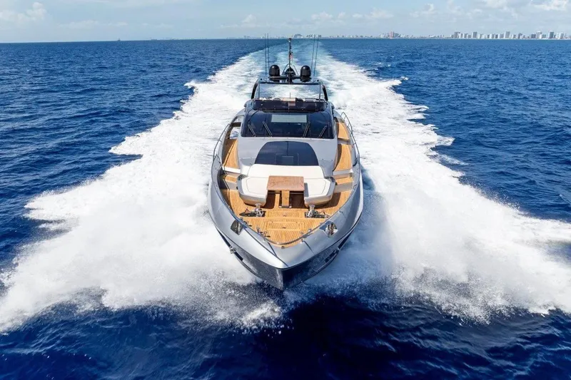 Slide: The Image of Luxury Riva 90' Argo yacht cruising on open sea, 2022 model. - 2