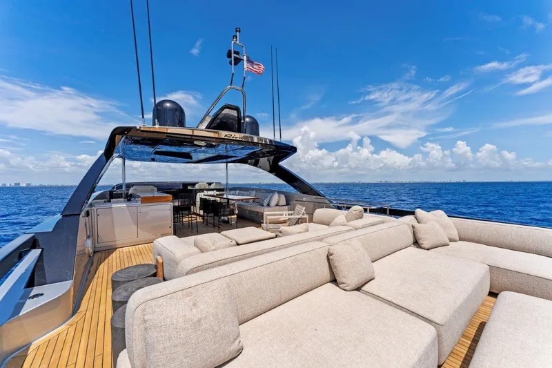Slide: The Image of Luxurious 2022 Riva 90' Argo yacht with spacious deck and ocean view. - 8