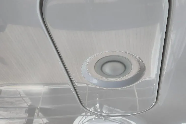 Slide: The Image of Close-up of a 2024 Sirena 58 Flybridge MY yacht's sleek light fixture. - 23
