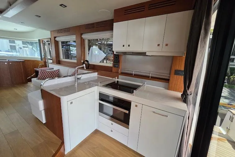 Slide: The Image of Luxurious interior of 2024 Sirena 58 Flybridge MY yacht with modern kitchen design. - 40