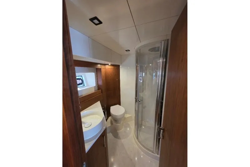 Slide: The Image of Luxurious bathroom in 2024 Sirena 58 Flybridge MY yacht with modern fixtures. - 75