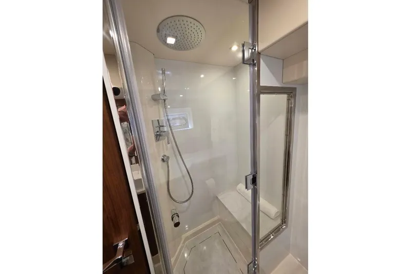 Slide: The Image of Luxurious shower area in 2024 Sirena 58 Flybridge MY yacht bathroom. - 80
