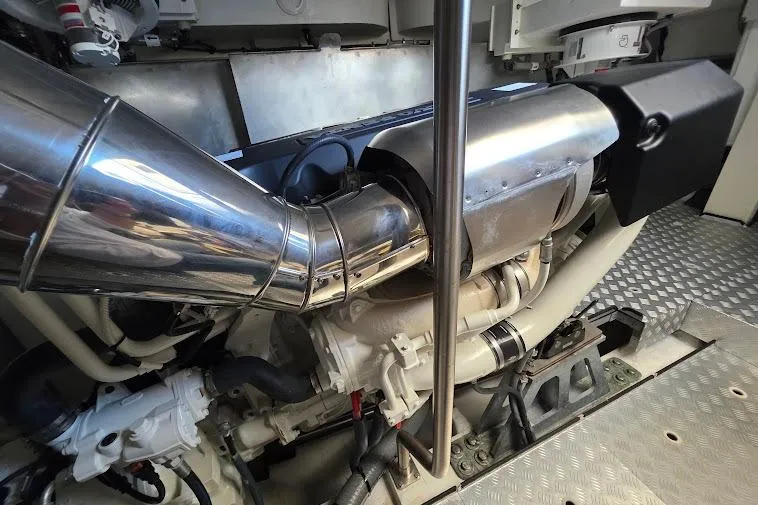 Slide: The Image of Engine room of 2024 Sirena 58 Flybridge MY yacht, showcasing polished metal components. - 94