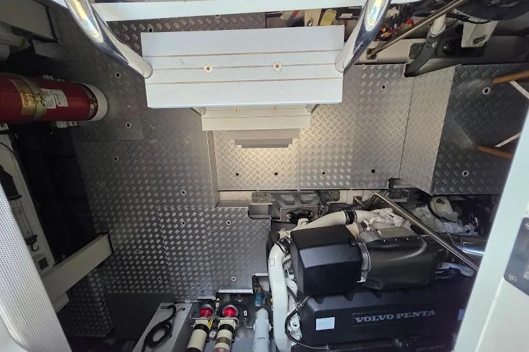 Slide: The Image of Engine room of 2024 Sirena 58 Flybridge MY with Volvo Penta engine. - 98