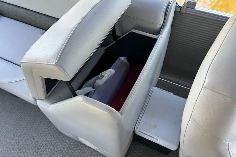 Slide: The Image of 2020 Avalon 2685 LSZ QL boat interior with open storage compartment. - 13