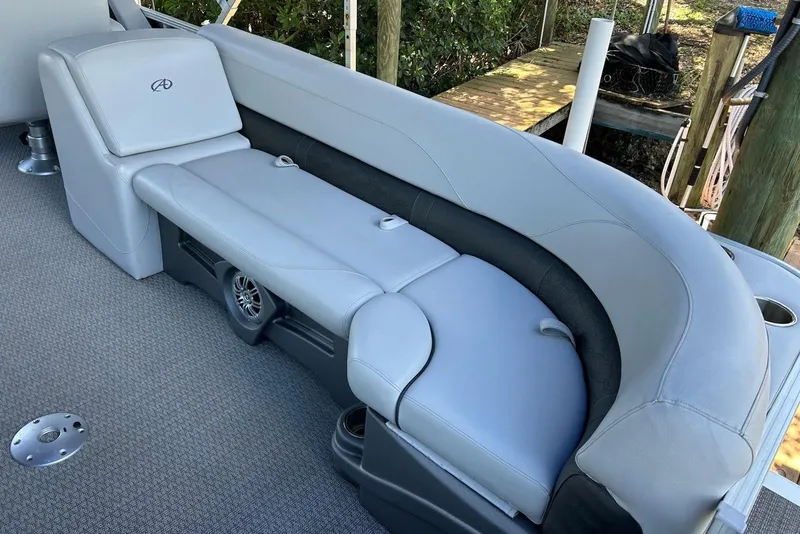Slide: The Image of 2020 Avalon 2685 LSZ QL pontoon boat interior with plush seating and modern dashboard. - 5