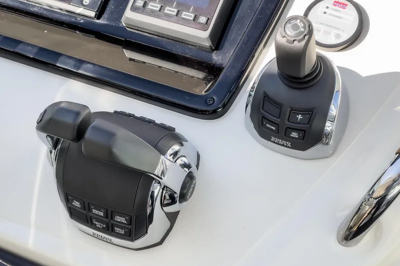 Slide: The Image of Control panel of a 2018 Beneteau Gran Turismo 40 yacht with joystick and throttle. - 17
