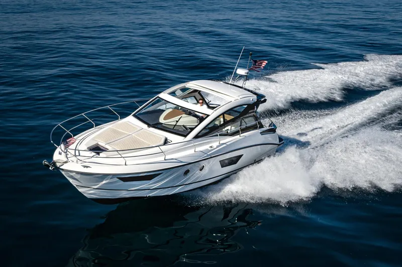 Slide: The Image of 2018 Beneteau Gran Turismo 40 cruising on open water, showcasing sleek design and performance. - 54