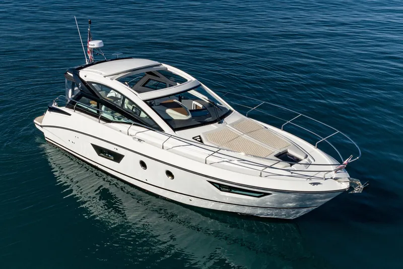 Slide: The Image of 2018 Beneteau Gran Turismo 40 yacht cruising on calm blue waters. - 61