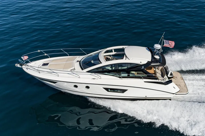 Slide: The Image of 2018 Beneteau Gran Turismo 40 yacht cruising on open water, displaying sleek design and performance. - 67