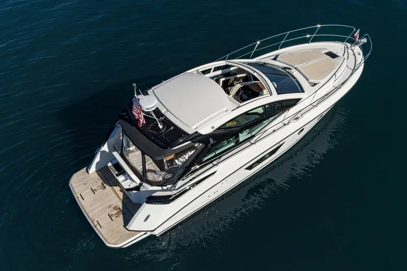 Slide: The Image of 2018 Beneteau Gran Turismo 40 yacht on calm blue water, aerial view. - 70