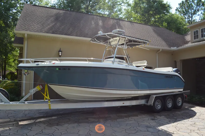 The Image of 2008 Century 2600 Center Console on trailer in driveway. - 0