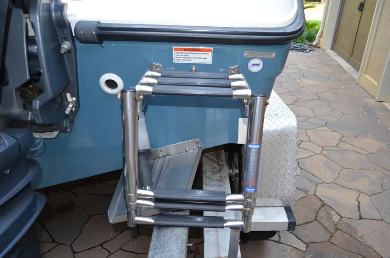 Slide: The Image of Ladder on the stern of a 2008 Century 2600 Center Console boat. - 12