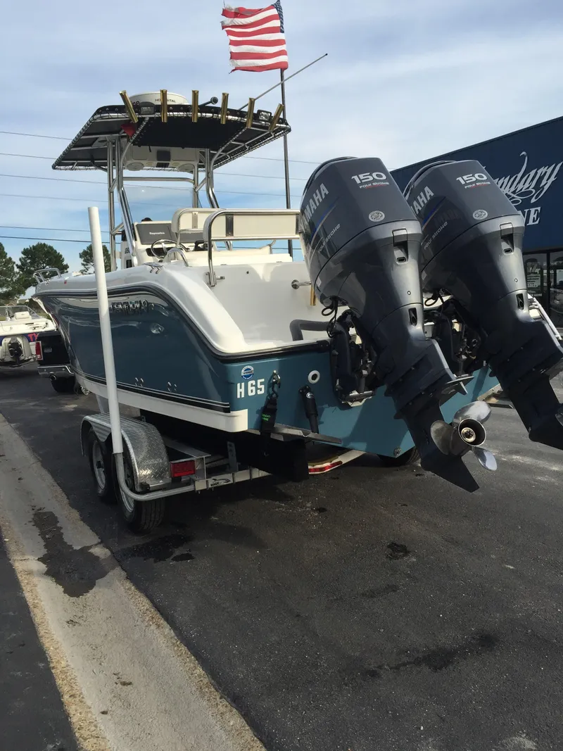 Slide: The Image of 2008 Century 2600 Center Console boat with dual Yamaha engines. - 2