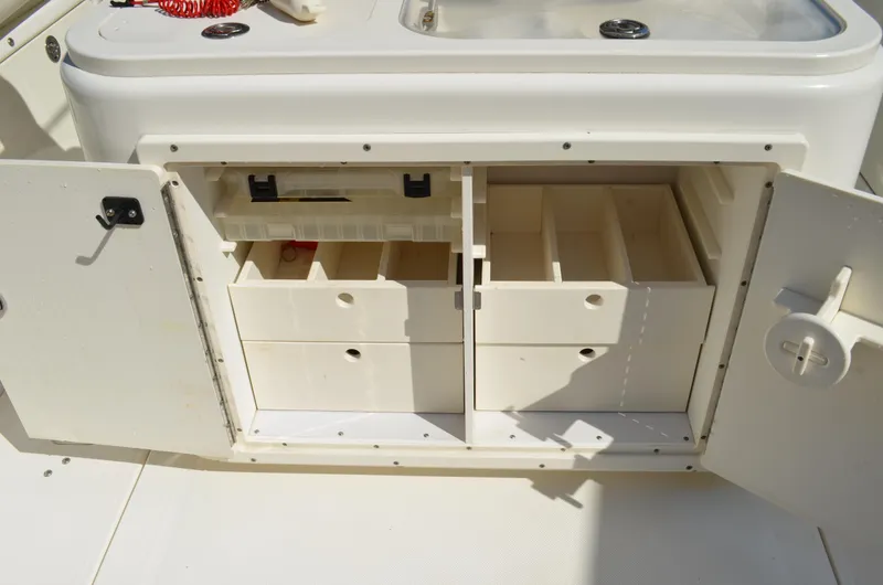 Slide: The Image of Storage compartment in 2008 Century 2600 Center Console boat. - 28