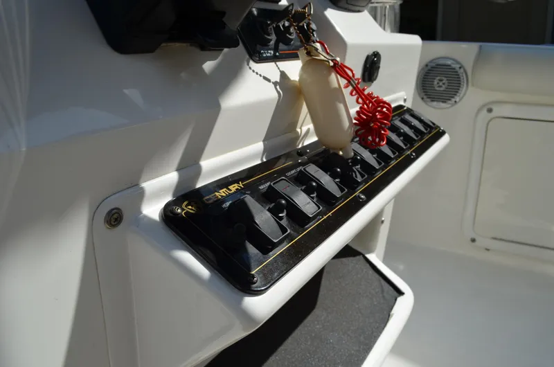Slide: The Image of Control panel of a 2008 Century 2600 Center Console boat. - 48
