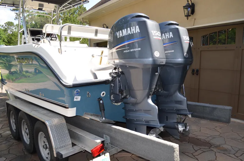 Slide: The Image of 2008 Century 2600 Center Console with Yamaha engines on trailer. - 5