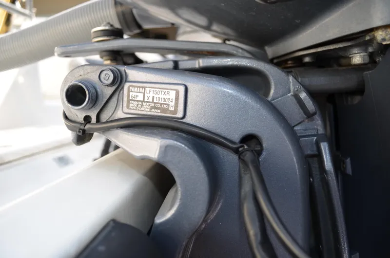 Slide: The Image of Close-up of a Yamaha engine part on a Century 2600 Center Console boat. - 8