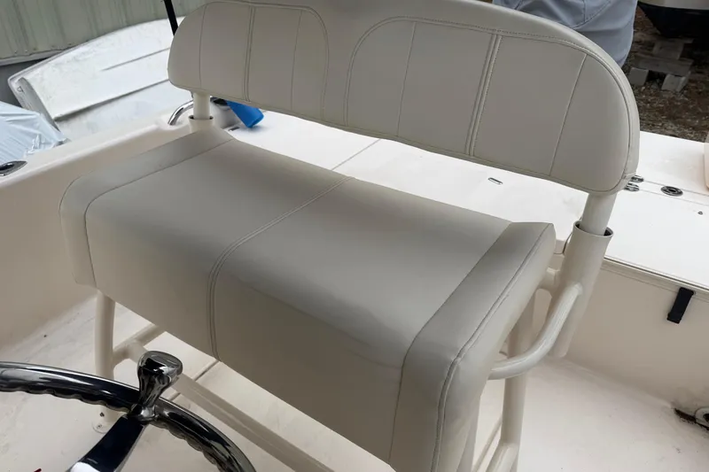 Slide: The Image of 2016 Grady-White 191 Coastal Explorer boat seat and steering wheel. - 5
