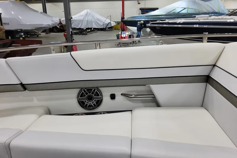 Slide: The Image of Interior of 2026 Formula 310 Bowrider OB, featuring white seating and speaker detail. - 13