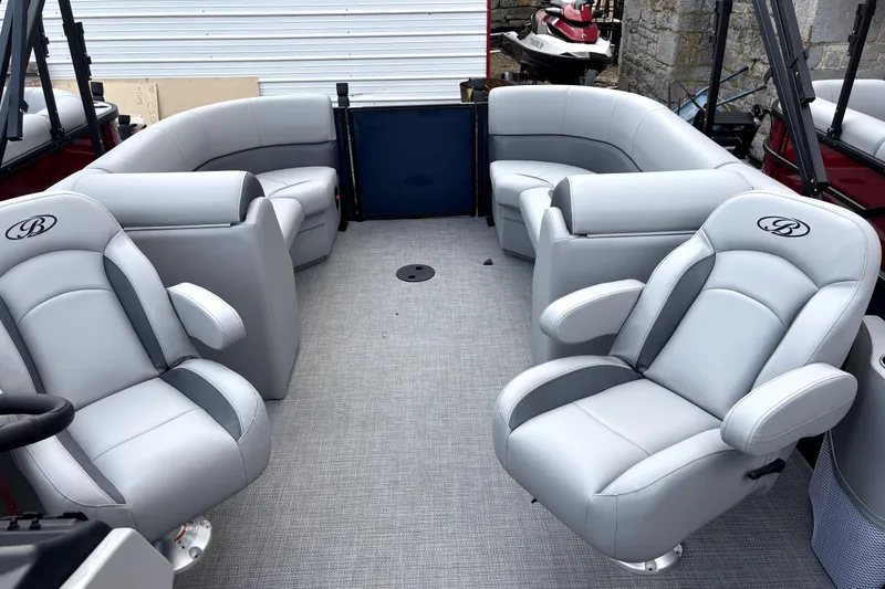 Slide: The Image of 2026 Bentley Pontoons Legacy 220 Navigator interior with luxurious seating and modern design. - 5