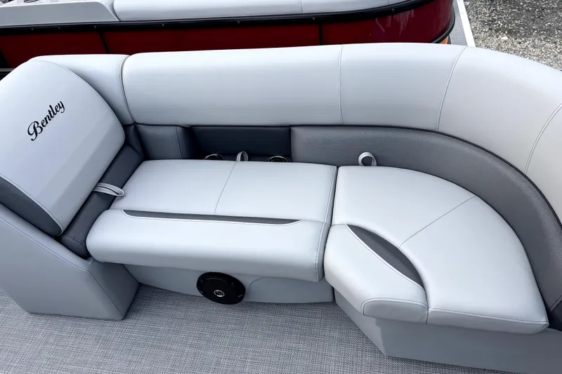 Slide: The Image of Luxurious seating on 2026 Bentley Pontoons Legacy 220 Navigator boat. - 6