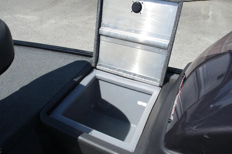 Slide: The Image of 2022 Tracker Bass Tracker Classic XL boat storage compartment open. - 11
