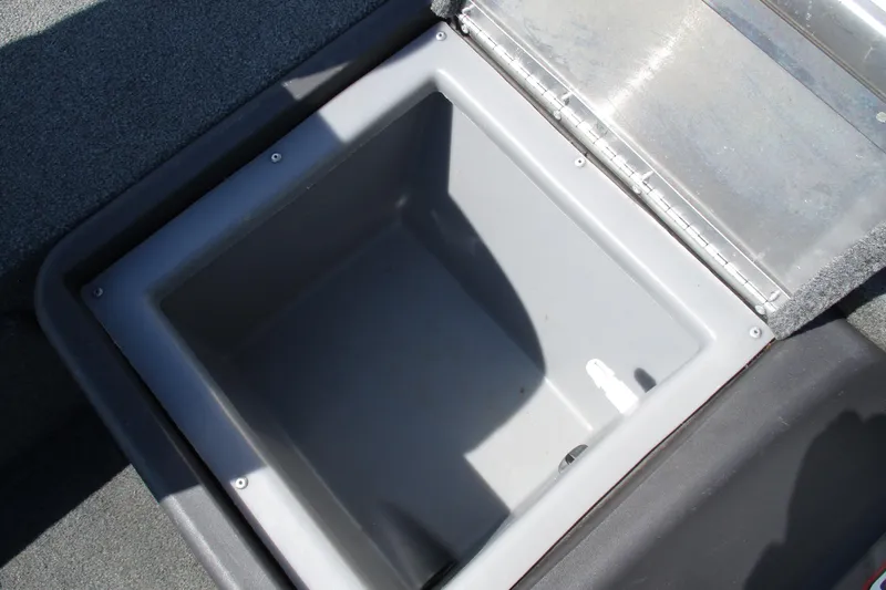 Slide: The Image of Open storage compartment in 2022 Tracker Bass Tracker Classic XL boat. - 12