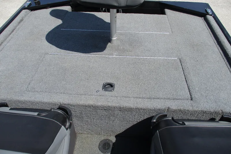 Slide: The Image of 2022 Tracker Bass Tracker Classic XL boat interior with carpeted deck and seating. - 16