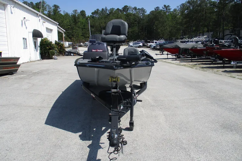 Slide: The Image of 2022 Tracker Bass Tracker Classic XL boat parked outdoors at a dealership. - 4