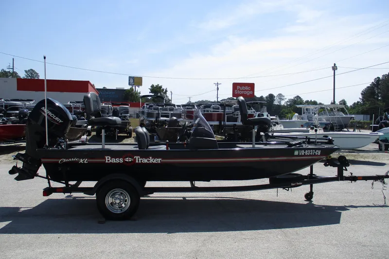 Slide: The Image of 2022 Tracker Bass Tracker Classic XL boat on trailer in parking lot. - 5