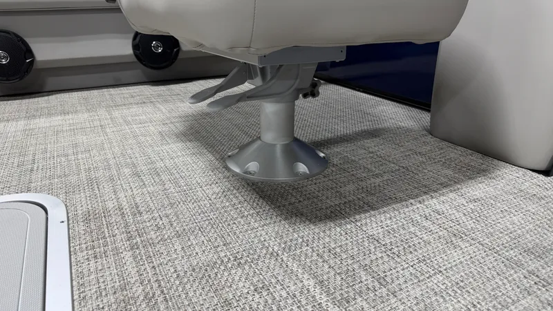 Slide: The Image of Close-up of a boat seat on a textured flooring. - 31