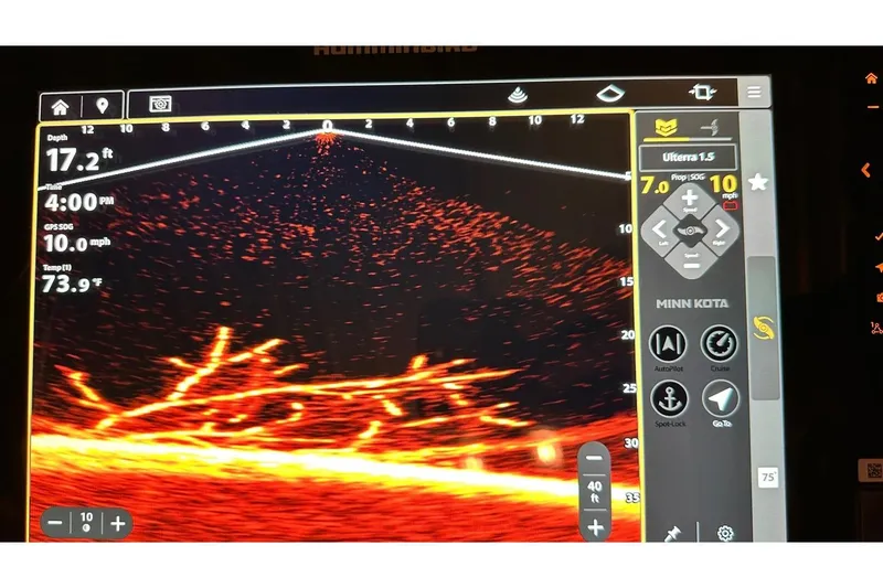 Slide: The Image of Fishfinder display on a 2026 Bass Cat Lynx STS boat, showing underwater terrain. - 22