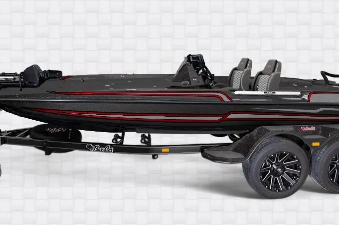 Slide: The Image of 2026 Bass Cat Lynx STS boat with sleek design on a trailer. - 29