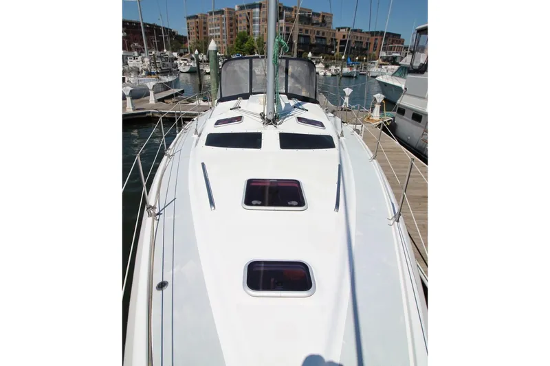 Slide: The Image of Sailboat deck view of 2000 Hunter 410 model docked at marina. - 11