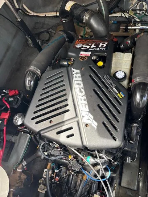 Slide: The Image of Engine compartment of a 2003 Sea Ray 340 Sundancer with Mercury 8.1S motor. - 15