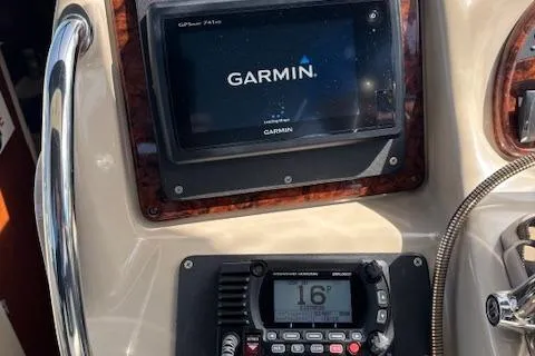 Slide: The Image of Engine of a 2003 Sea Ray 340 Sundancer boat, featuring a Mercury 5.7L V8. - 17