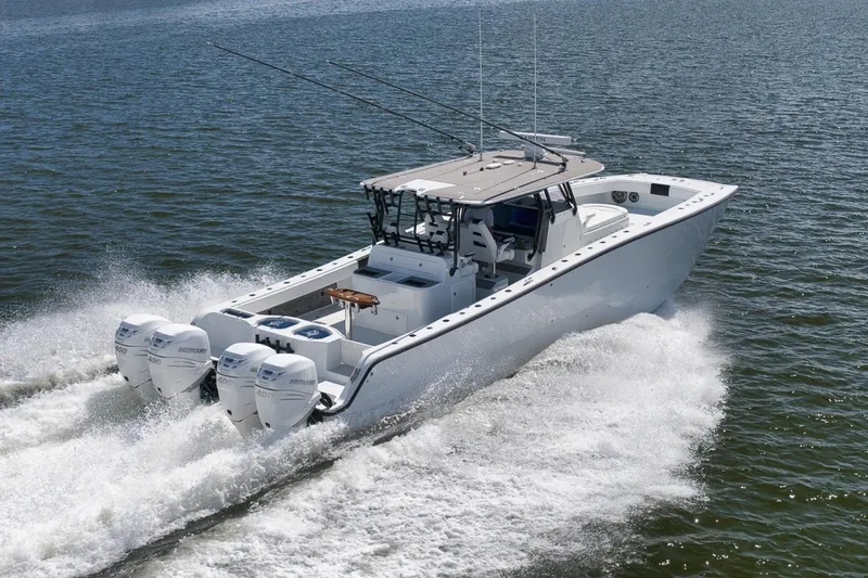 Slide: The Image of 2020 Freeman 42LR boat cruising on open water with powerful engines. - 12