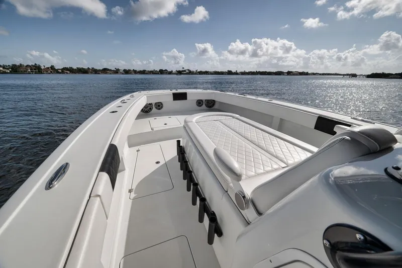 Slide: The Image of Luxury Freeman 42LR boat interior, 2020 model, featuring sleek seating and ocean view. - 18