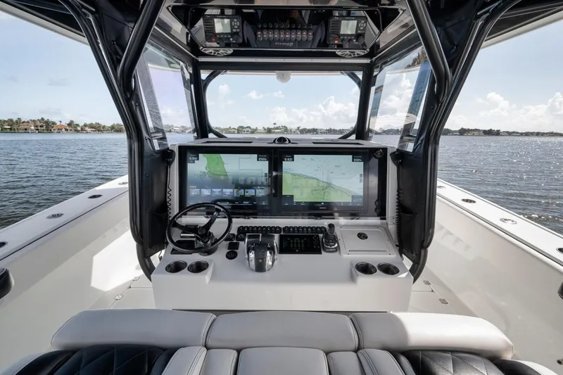 Slide: The Image of Cockpit of 2020 Freeman 42LR boat with advanced navigation system on open water. - 28