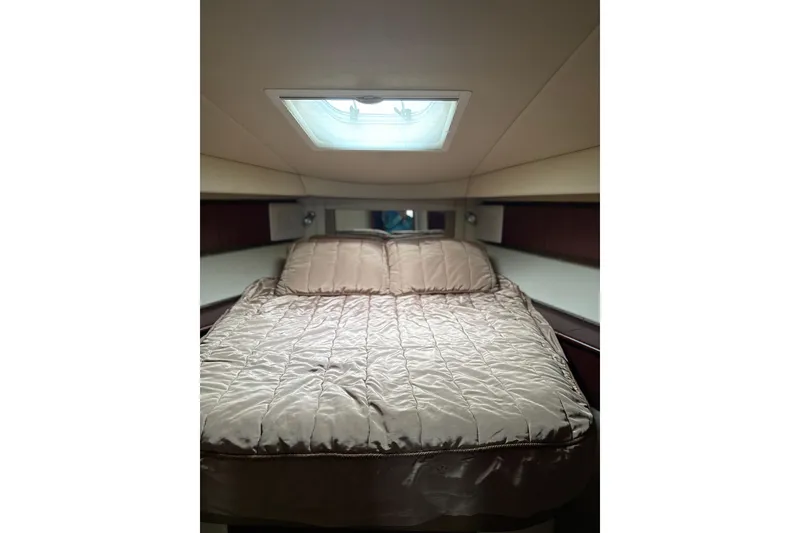 Slide: The Image of Luxurious bedroom interior of 2007 Sea Ray 44 Sedan Bridge yacht. - 50